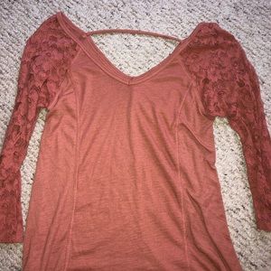 Peach colored long sleeve with lace sleeve size xs